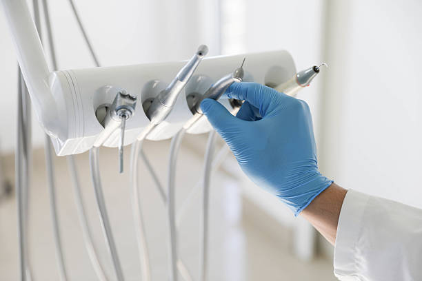 Professional Emergency Dentist technician working in Grandville, MI